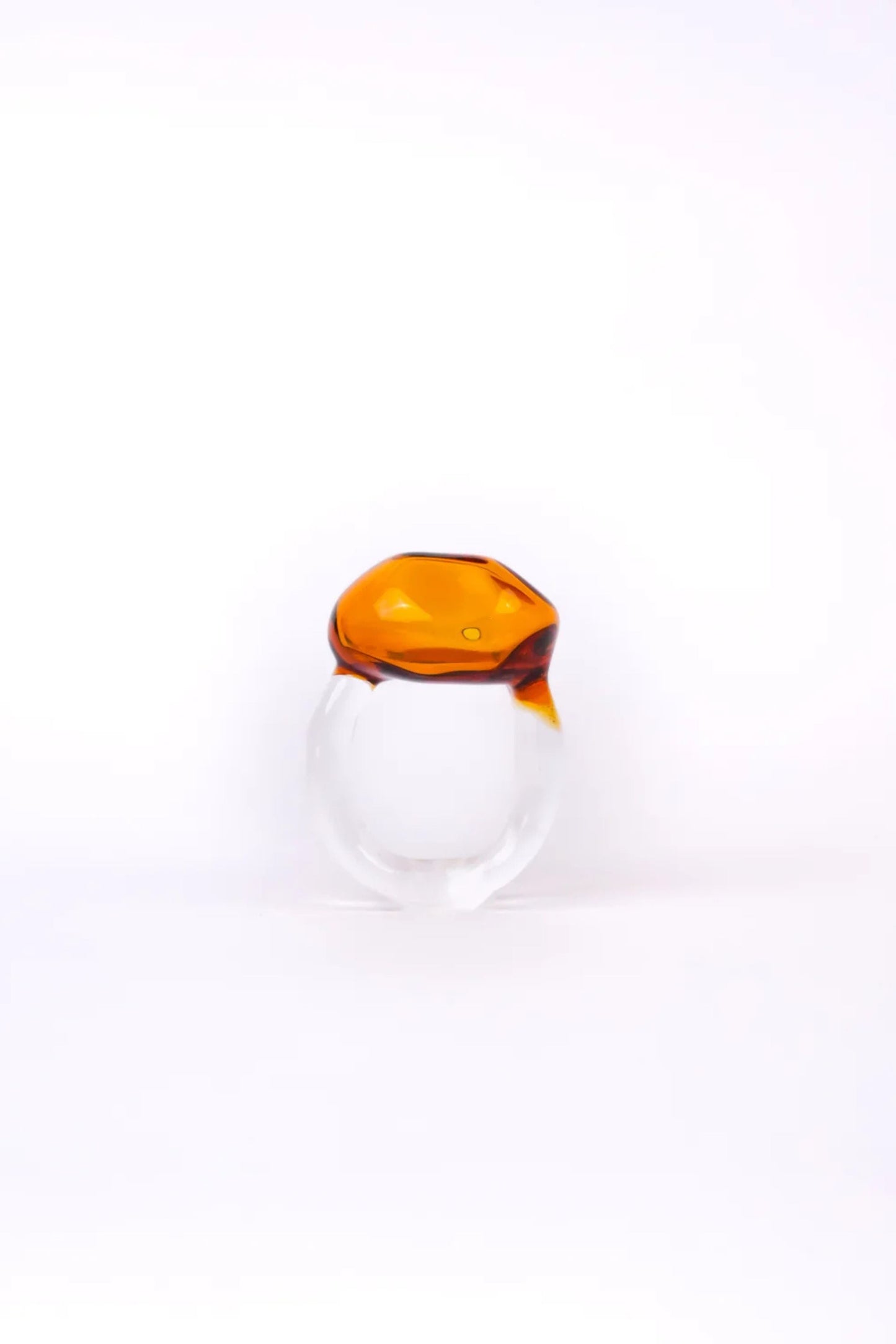 The Amorphous Ring in Amber