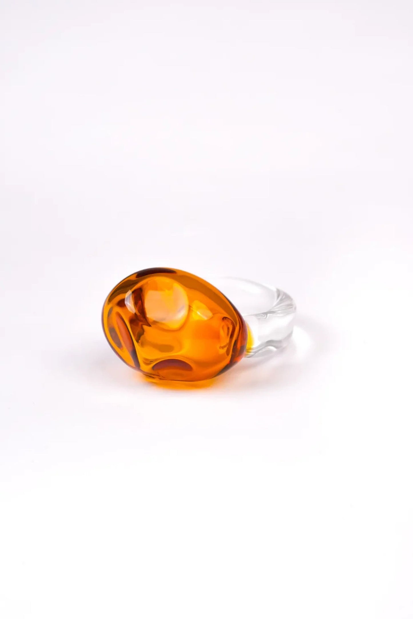 The Amorphous Ring in Amber