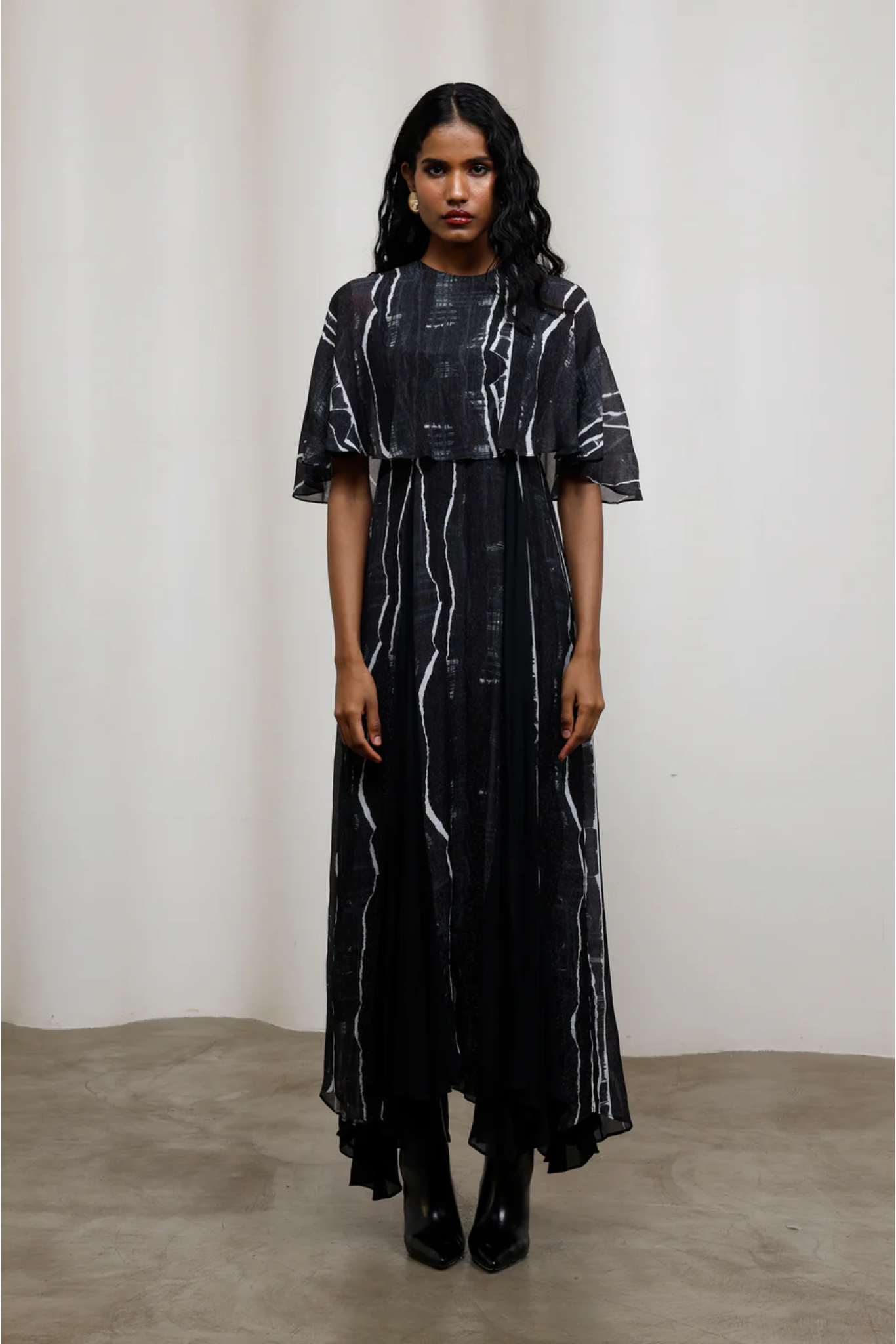 Rei Maxi