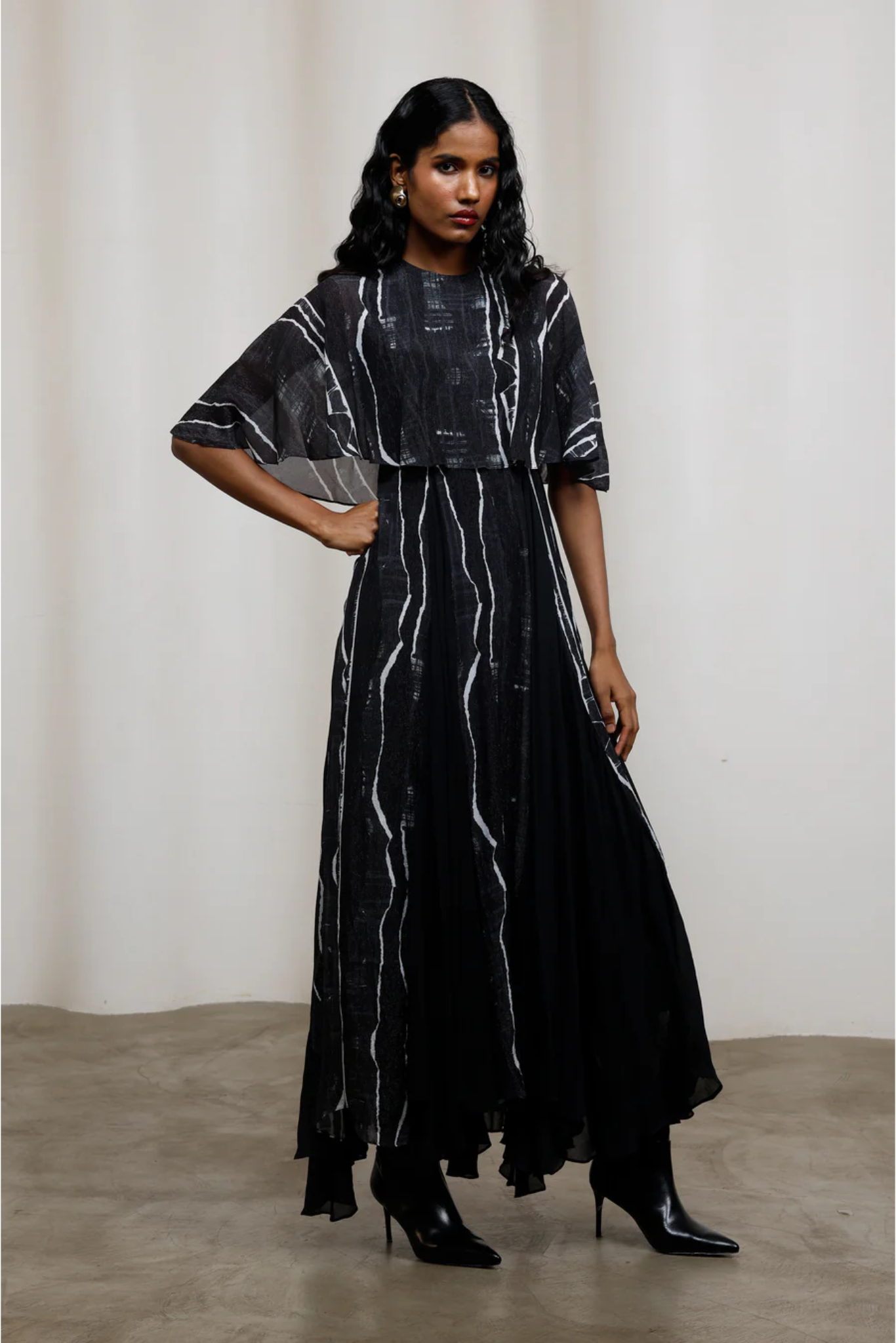 Rei Maxi