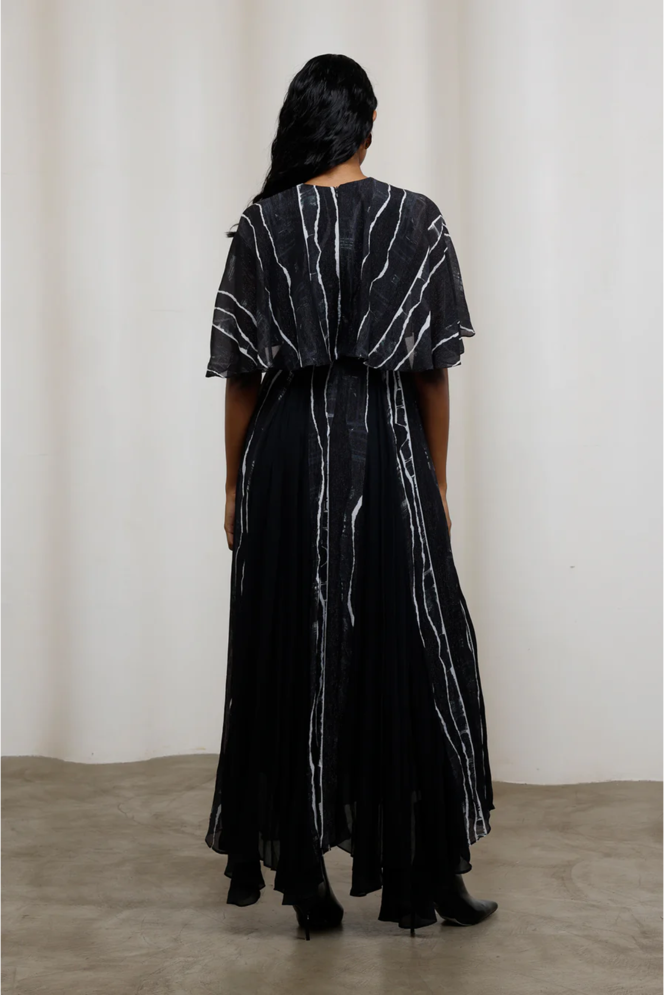 Rei Maxi