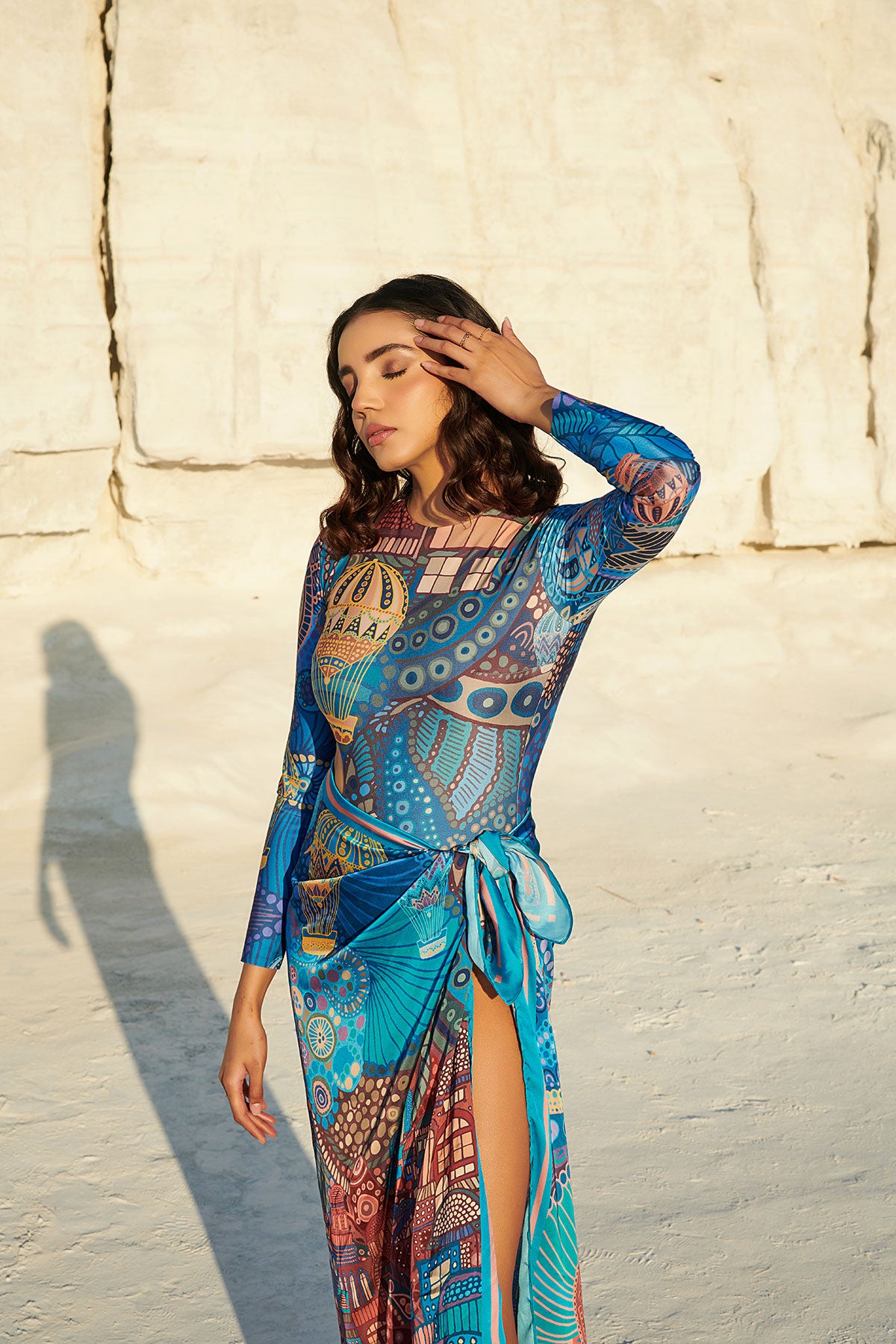 Long-Sleeved Halo Swimsuit paired with Beach Bum Sarong in - CAPPADOCIA