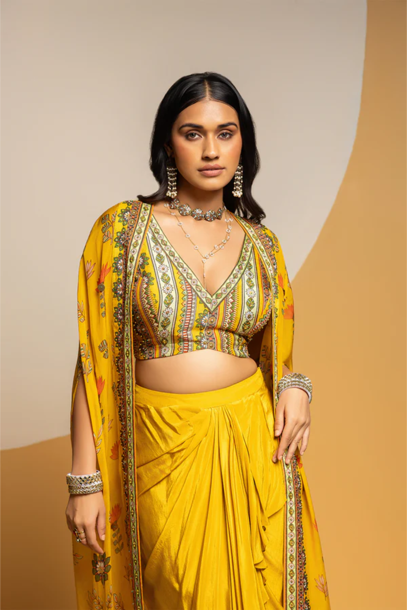 Taarani embellished drape skirt set with long cape