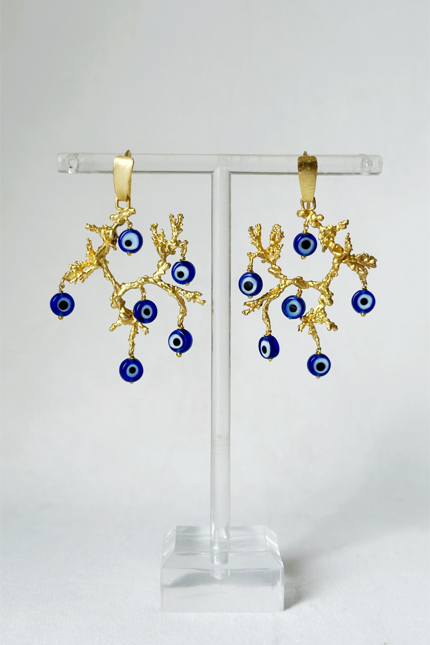 Evil eye untamed chandelier earrings Gold
