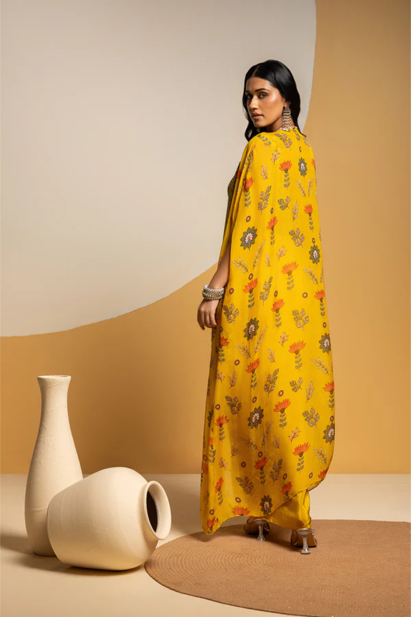 Taarani embellished drape skirt set with long cape