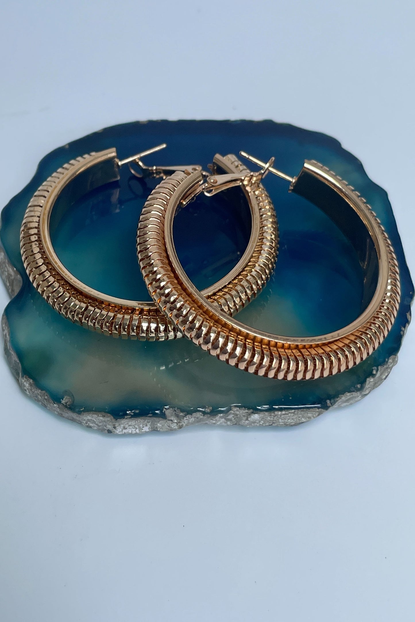 Rose gold finish textured hoops